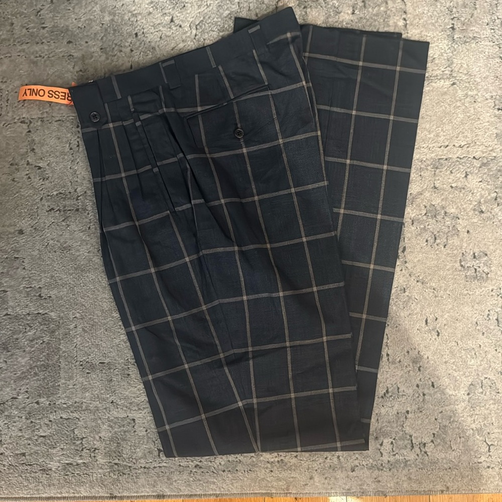 This is a men dress pants in a size 34R.